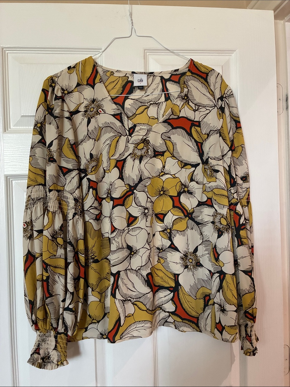 CAbi 3954. Floral V-Neck Blouse in Mustard, Ivory & Black with Orange Accents